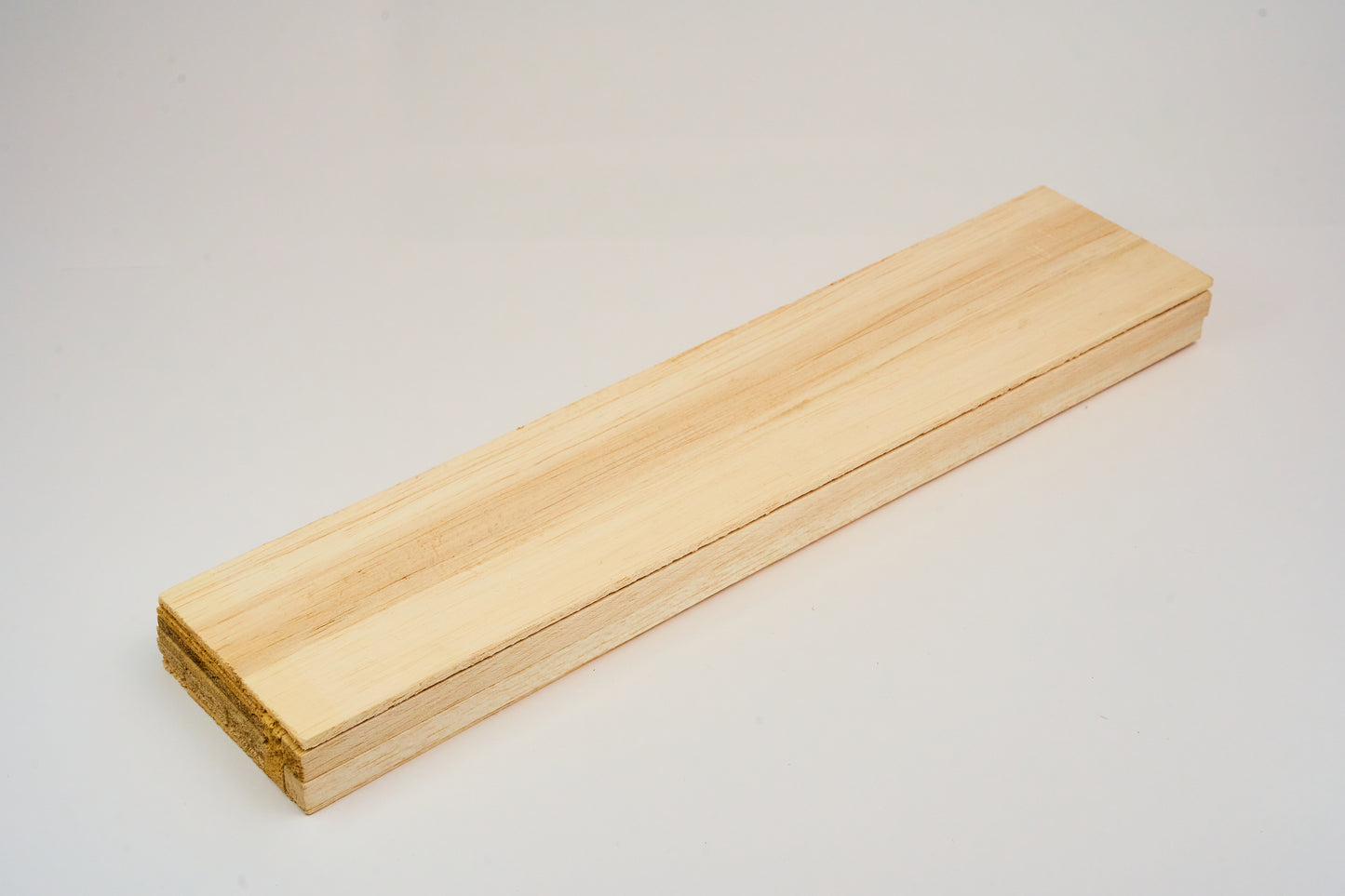 Close-up of mini balsa bundles, ideal for small-scale RC aircraft projects and repairs.