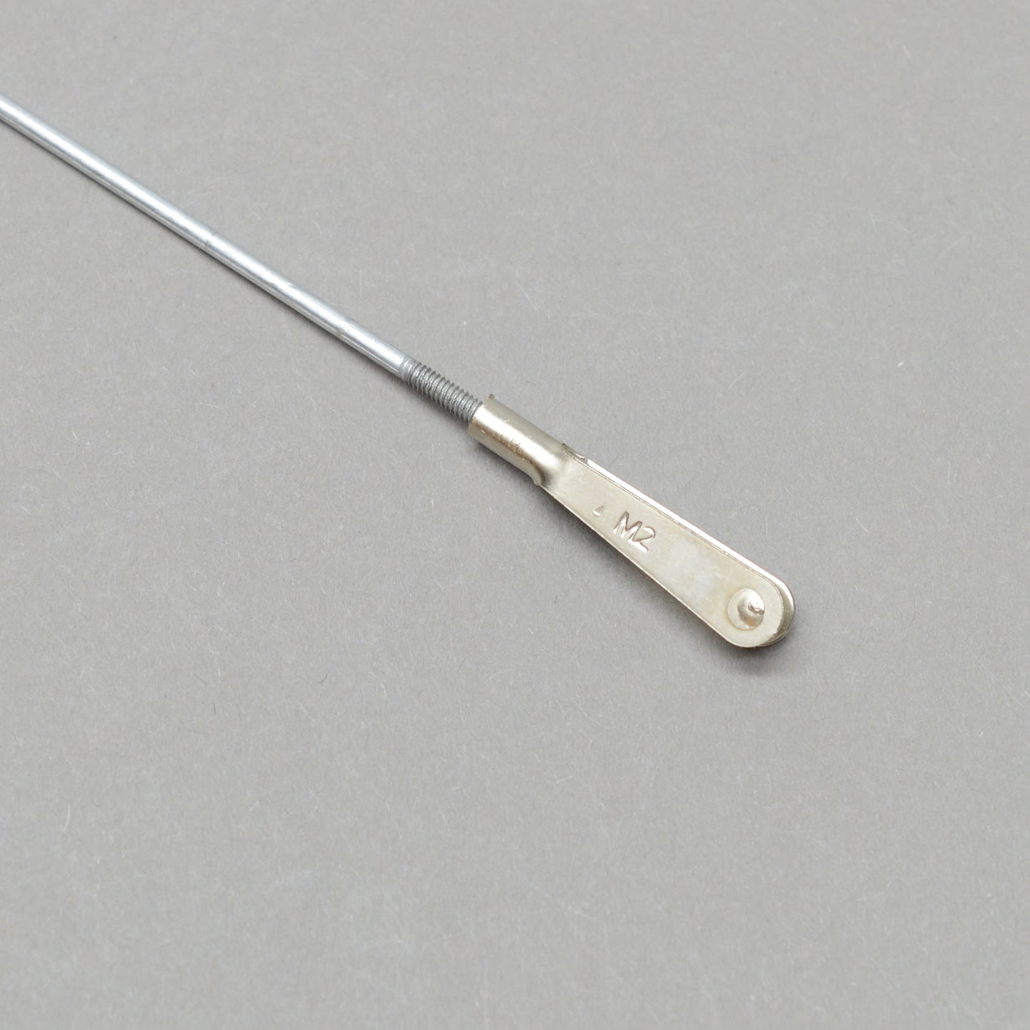 M2 Metal Quick link with 9″ threaded rod M2: M2 metal quick link with 9″ threaded rod, offering adjustable linkage connections for RC aircraft.