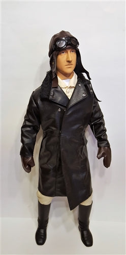 WWI German Pilot figure for RC planes, wearing a classic flight suit and helmet, ideal for scale model aircraft.