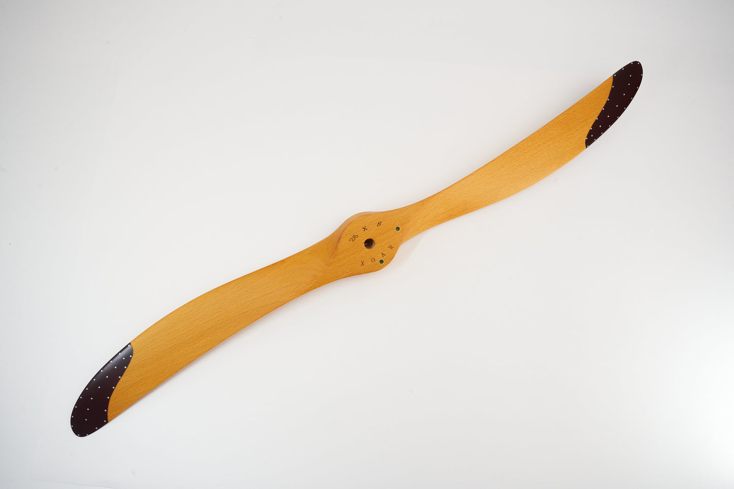 Painted beechwood propeller by Xoar, featuring a scimitar two-blade design for petrol RC aircraft engines